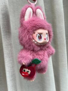 strawberry labubu is handmade and each one is unique